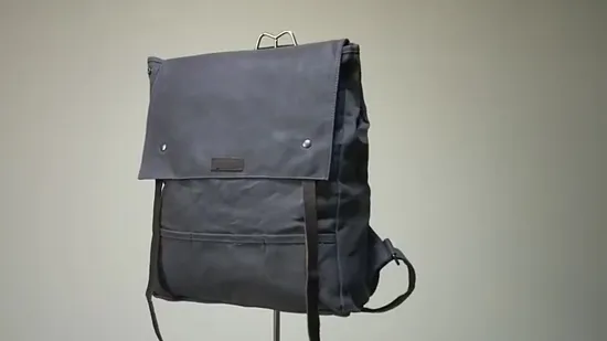 Mochilas de lona de algodão simples por atacado da China com bolsos e logotipo personalizado em relevo para esportes de lazer estudantis, mochilas de viagem e pacotes diários